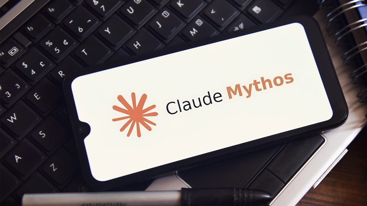 Claude Mythos logo displayed on a smartphone resting on a keyboard, Anthropic's limited-release frontier model